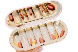 Dosey 7-day pill compact with mirror and daily labeled compartments